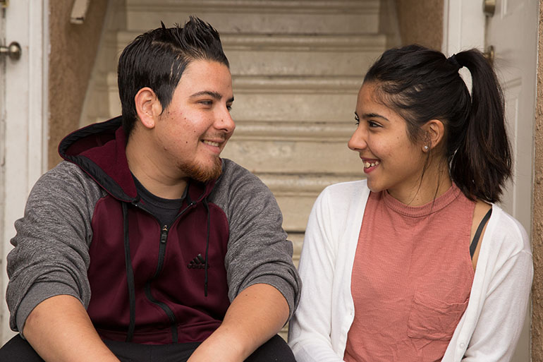 Tapia and his sister, Alma, 24. Tapia’s family noticed his improvement from the exercise and computer training. (Courtesy of the University of California, Los Angeles)