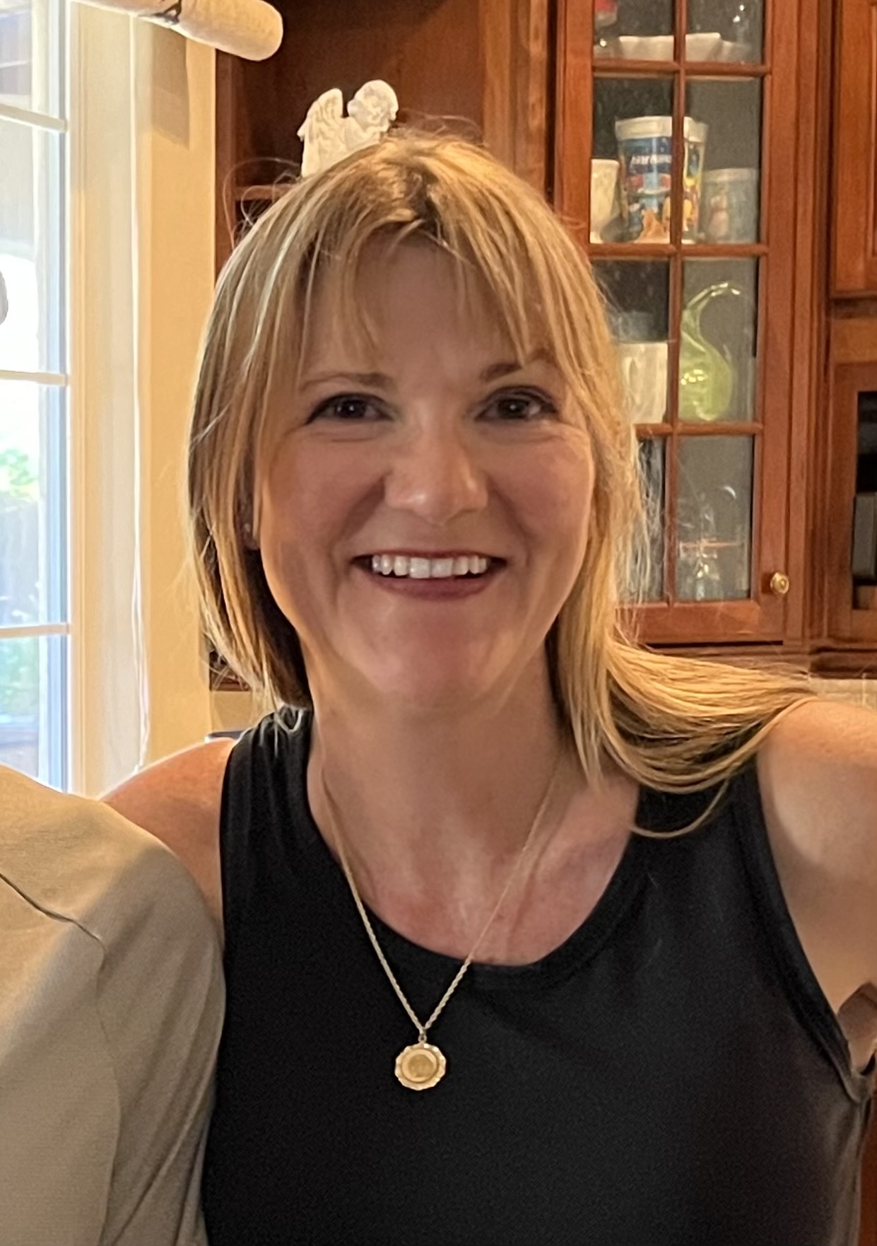 A photo of Theresa Schmotzer indoors.