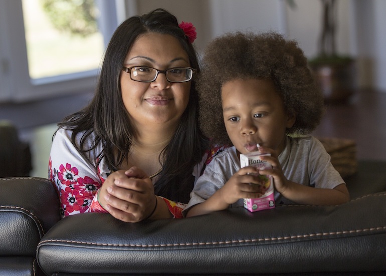 Kimberly Turbin, 29, and her son Rio Turbin, 3, in Stockton, Calif., on June 23, 2016. The video of her episiotomy is on YouTube and has been viewed more than 420,000. (Robert Durell for Kaiser Health News)