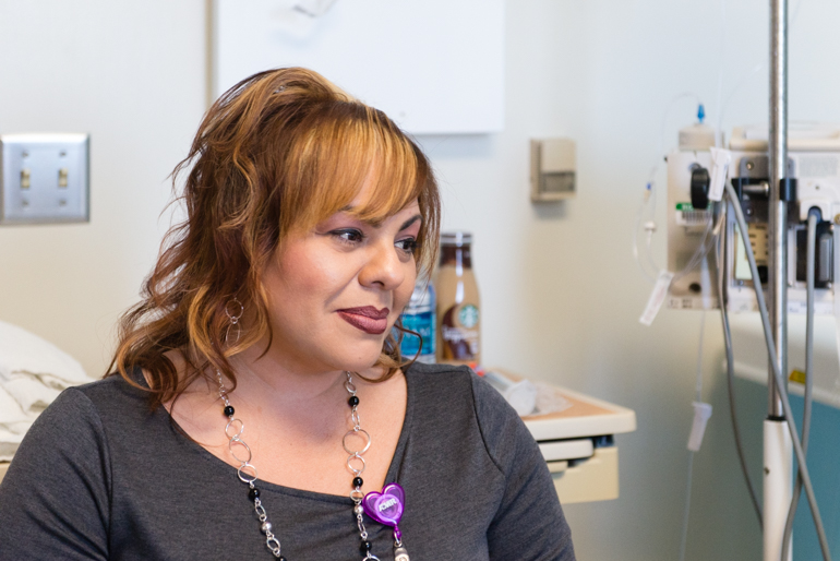 Medical interpreter Veronica Maldonado helps doctors and nurses in the palliative care team translate difficult end-of-life concepts at Riverside University Health System Medical Center in Moreno Valley, Calif. (Heidi de Marco/CHL)