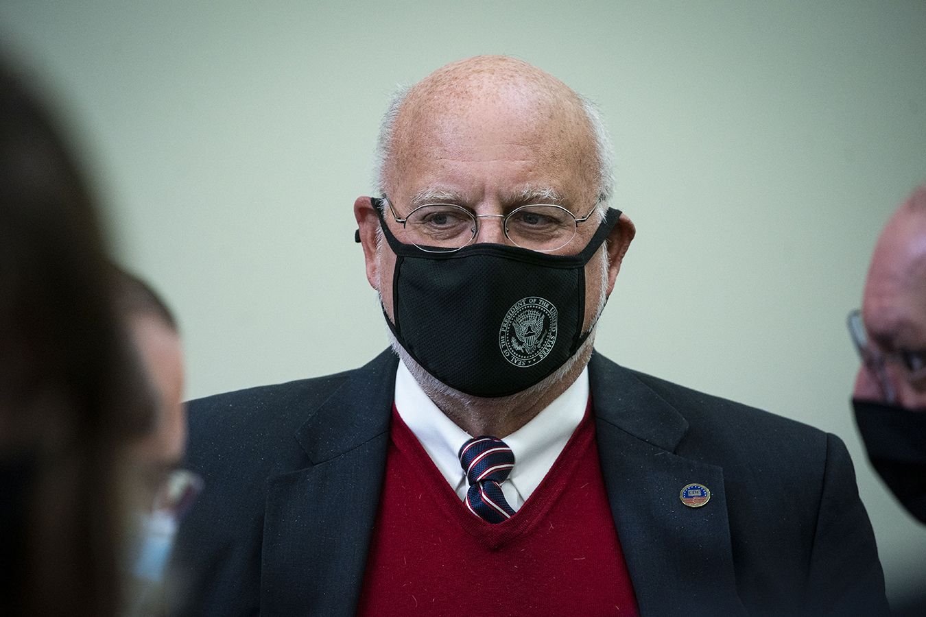 portrait of Robert Redfield wearing a mask