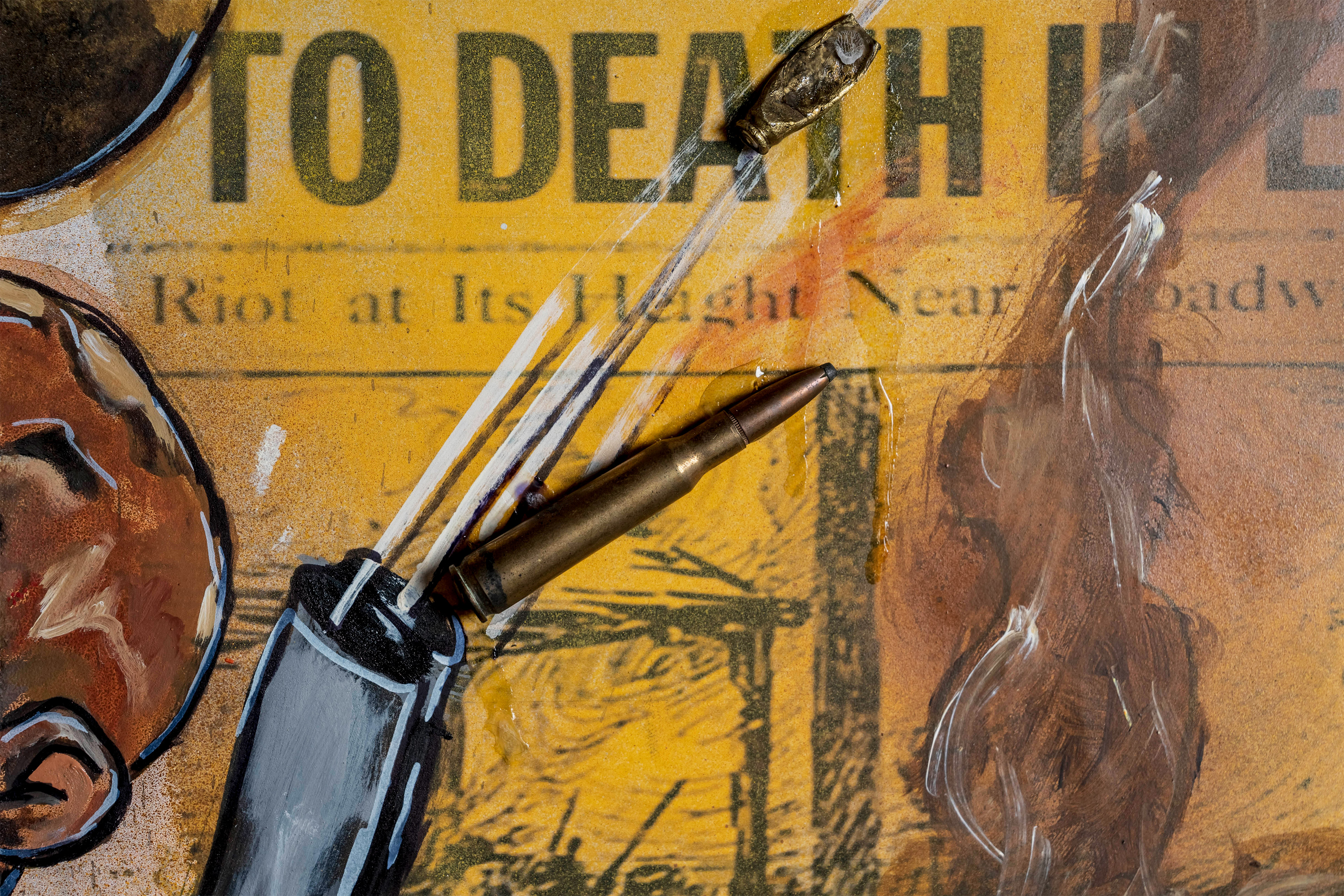 A close-up photo shows a painting that incorporates bullet shells and newspaper clippings into it.