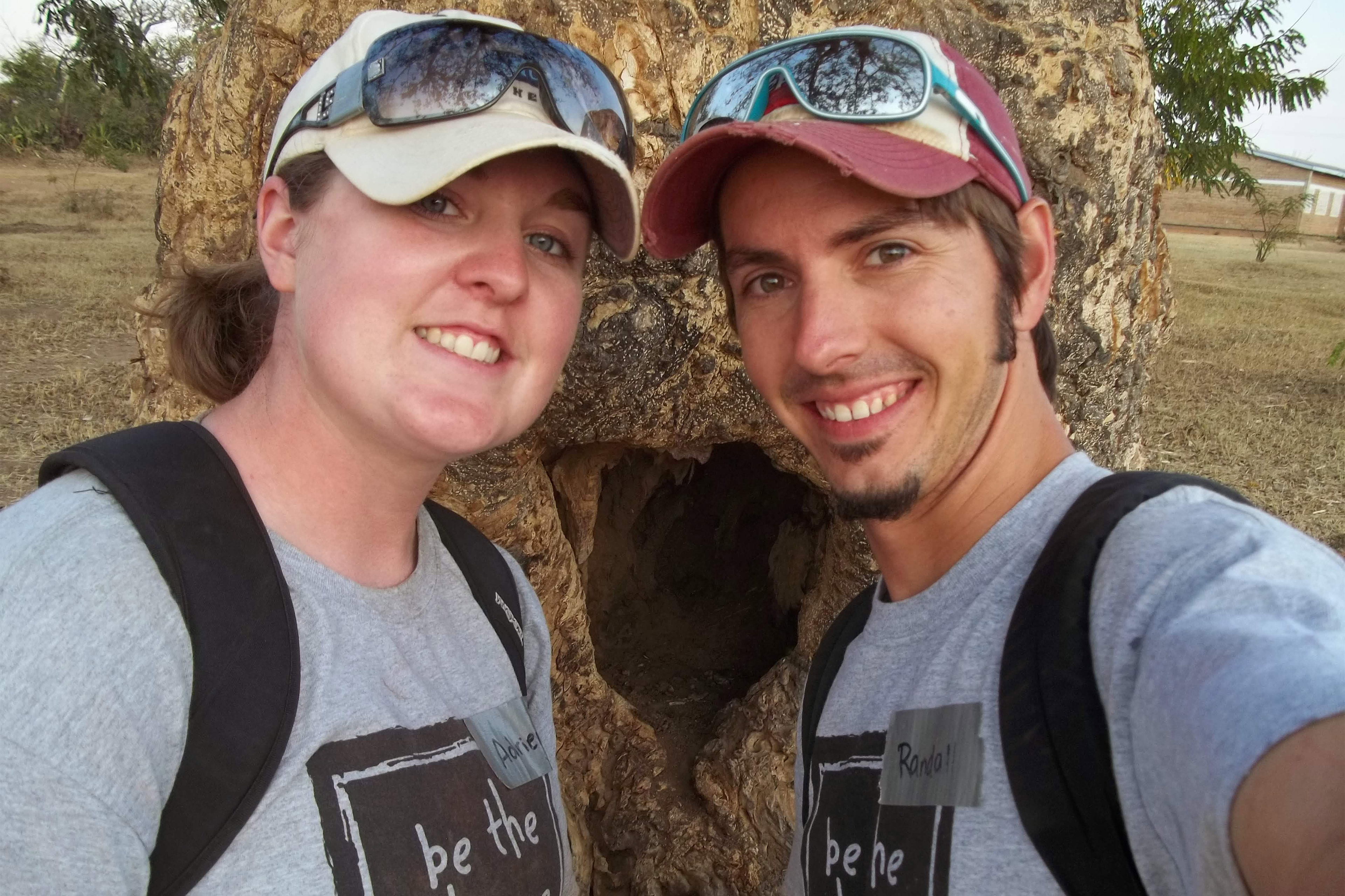 A photo shows Adrienne and Randall Siddens posing for a selfie together outside.