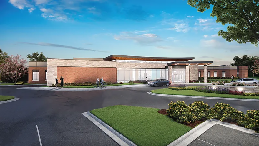 An architectural rendering shows a plan for a large psychiatric hospital to be built.
